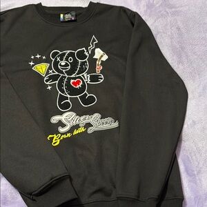 Black Crewneck Sweater with Playful Graphic Design